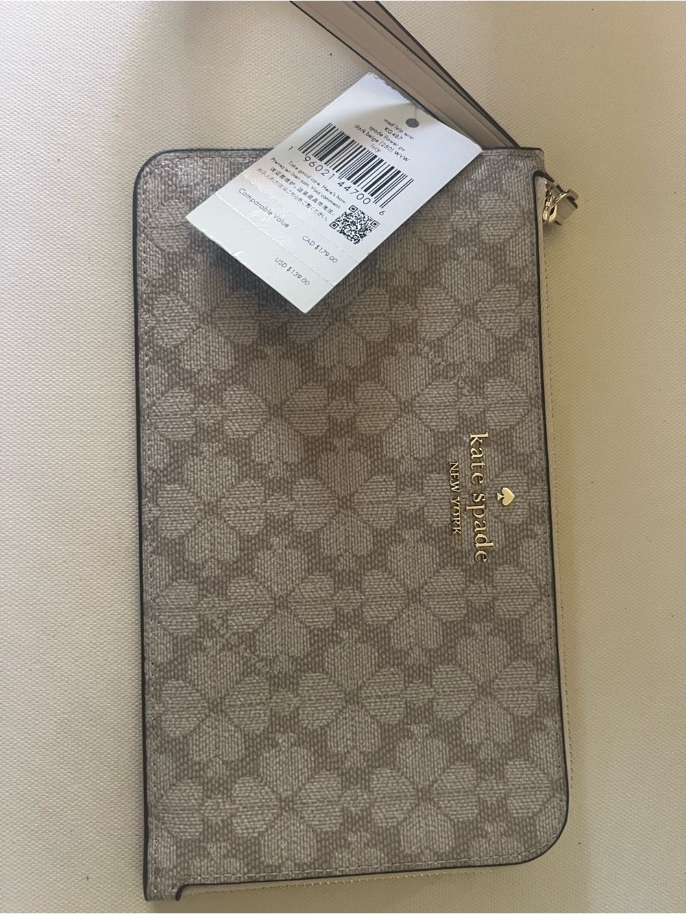 kate spade Taupe Patterned Wristlet with Gold Logo
